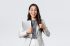 Business, finance and employment, female successful entrepreneurs concept. Young confident businesswoman in glasses, showing thumbs-up gesture, hold laptop, guarantee best service quality.